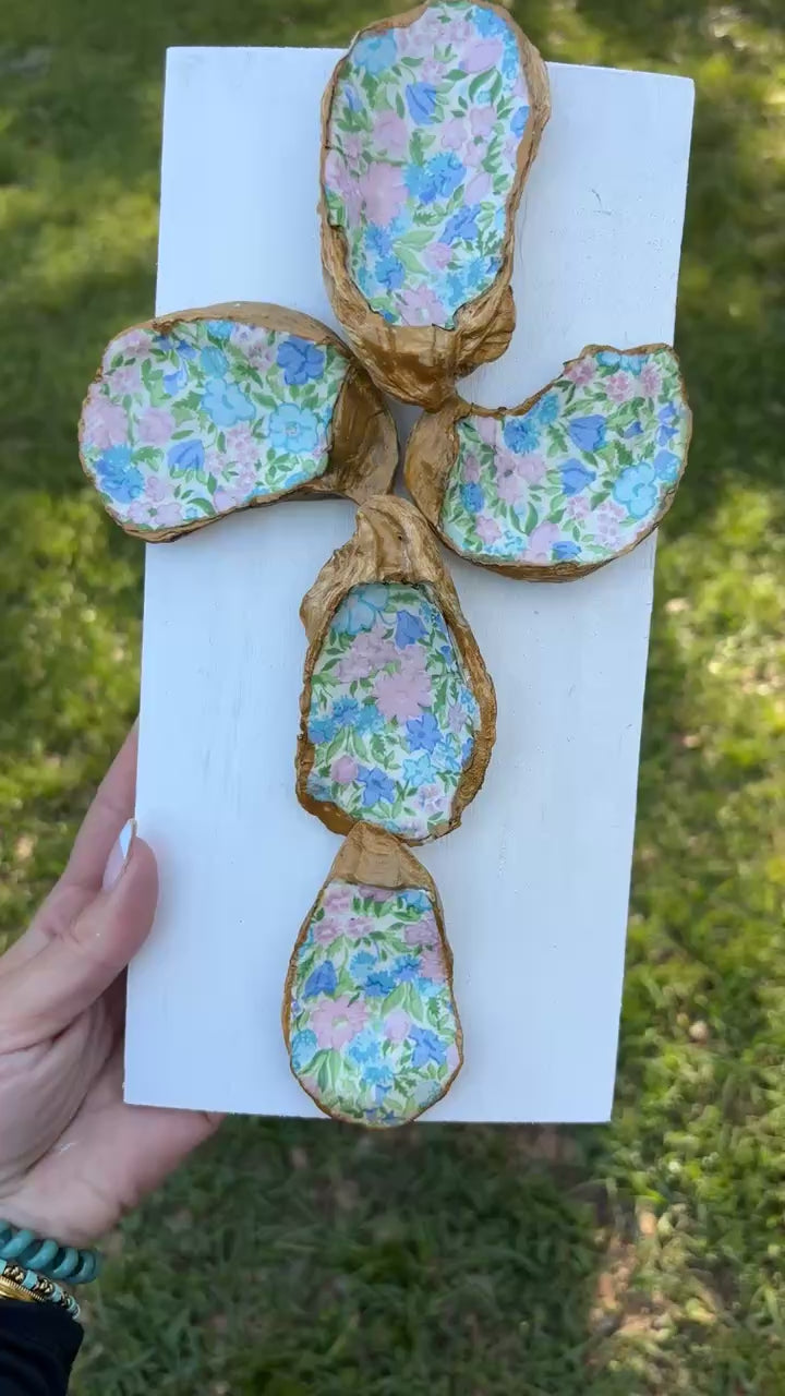 Floral oyster shell cross